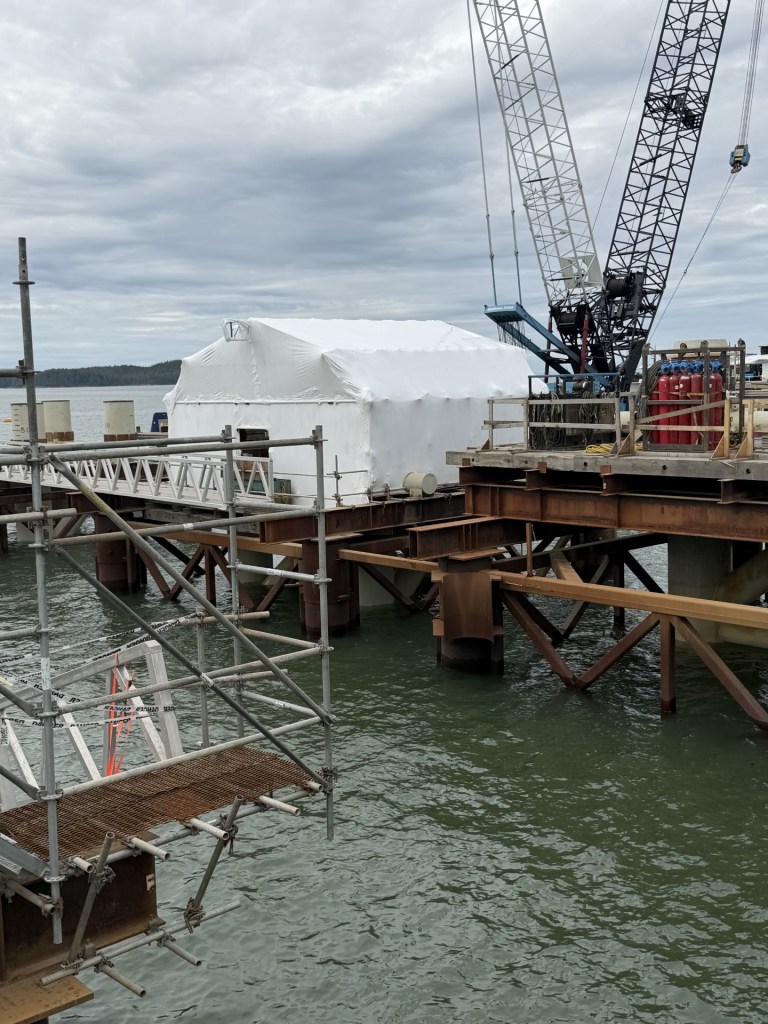 NWBC Containments shrink wrap project showcasing weather-tight protection